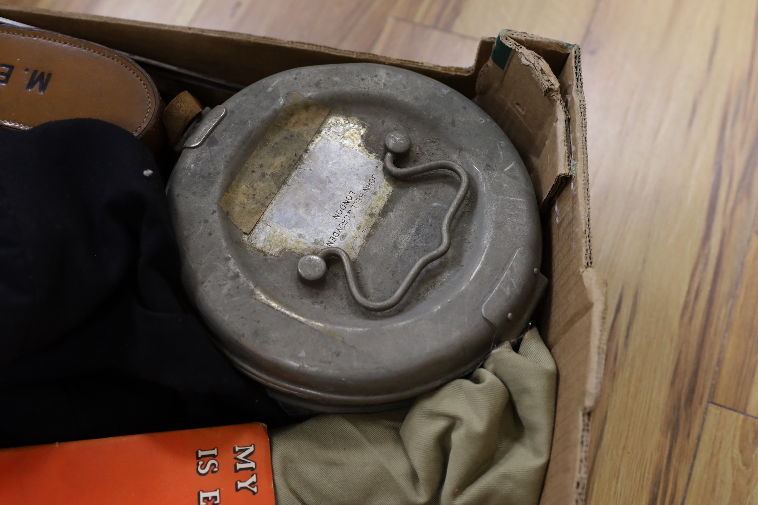 A box of militaria items